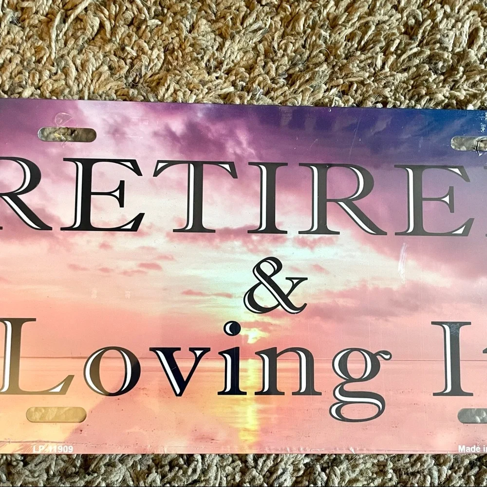 NEW Retired & Loving It License Plate Metal Sign